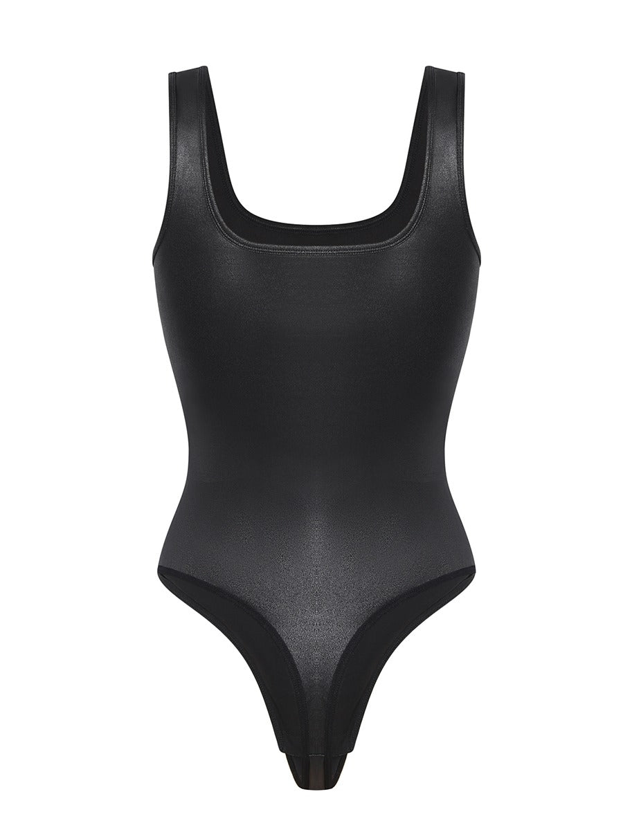 Shapewear & Co by Chiquis on Instagram: This seamless compression suit is  a necessity for all women to enhance your body shape. Mid-thigh length  shapewear bodysuit that holds in your tummy in
